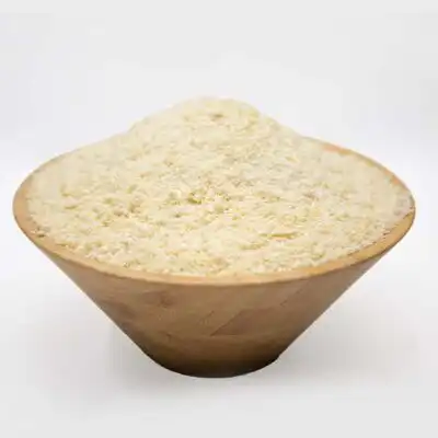 A wooden bowl of Bulk White Garri Online Baobabmart