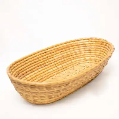 Cesta de pan ovalada de tejido africano