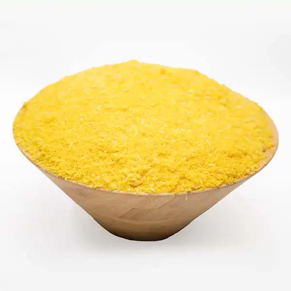 A wooden bowl of Wholesale Yellow Garri Online from Baobabmart