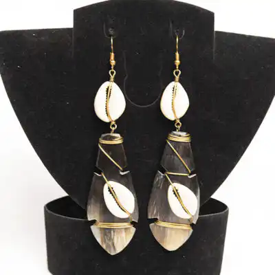 Ox Horn Leaf Earrings Decorated with Cowries – Handcrafted African Elegance available at Baobabmart