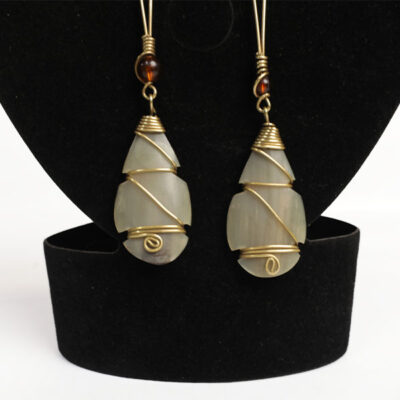 Stylish Ox Horn Earrings Decorated with Brown Beads - Available at Baobabmart