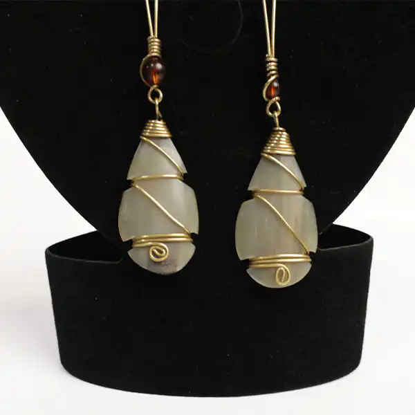 Stylish Ox Horn Earrings Decorated with Brown Beads - Available at Baobabmart