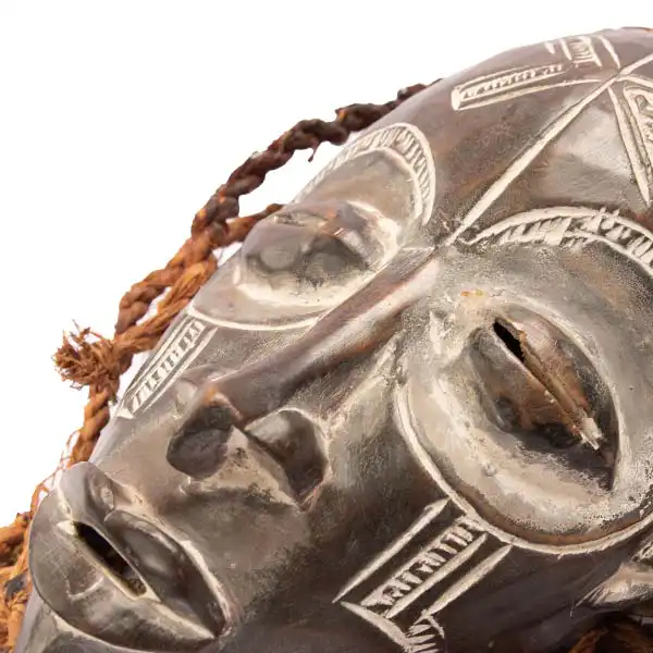 African Chokwe mask 5 African Chokwe Mask with Raids, handcrafted with intricate details, symbolizing tribal heritage and culture, available at BaobabMart.