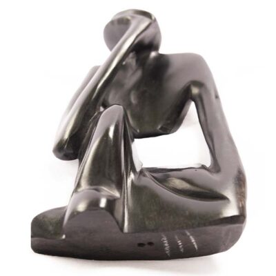 Black African Woman Thinker Statue, handcrafted with intricate details, symbolizing grace and resilience, available at BaobabMart.