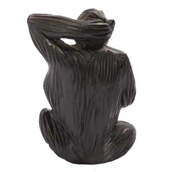 African monkey figurine 1 Vintage Ebony African Monkey Figurine, handcrafted with intricate details, perfect for decor or collections, available at BaobabMart.