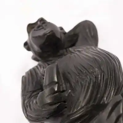 Vintage Ebony African Monkey Figurine, handcrafted with intricate details, perfect for decor or collections, available at BaobabMart.