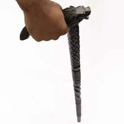 Traditional African Cane with Lion Head, handcrafted with intricate details, symbolizing power and authority, available at BaobabMart.