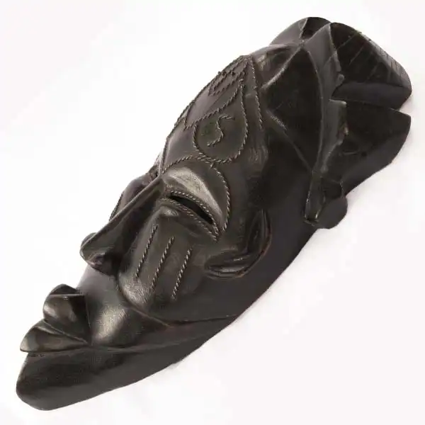 Black African Tikar mask 2 Black African Handmade Tikar Mask, handcrafted African decor piece with cultural design, available at Baobabmart.