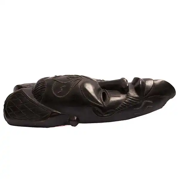 Black wood carved African mask 2 Black Hand Carved African Wooden Mask, intricately designed for decor or collections, available at BaobabMart.