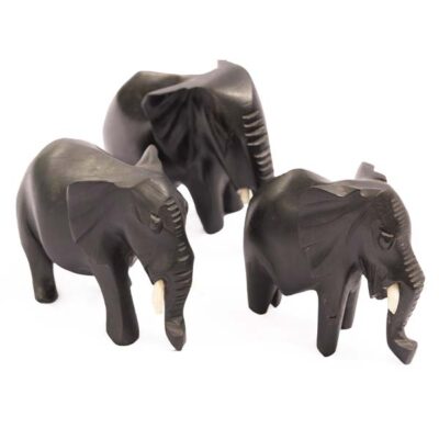 Handcrafted African Elephant Family Moving Together figurine, showcasing unity and intricate detailing, available at Baobabmart.