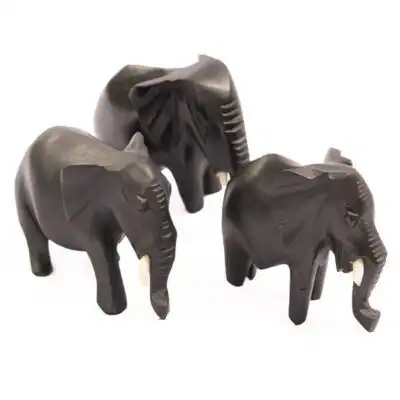 Handcrafted African Elephant Family Moving Together figurine, showcasing unity and intricate detailing, available at Baobabmart.