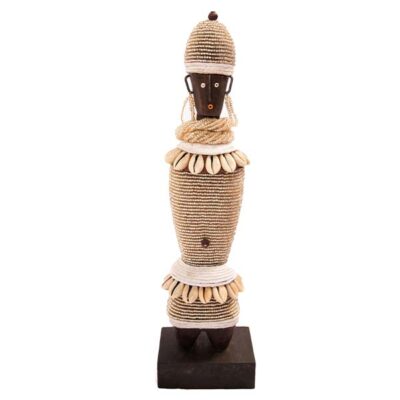Female Namji African Doll crafted with wood and cowrie shells, showcasing authentic African artistry, available at Baobabmart.