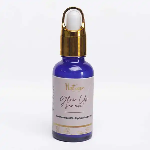 Nat Care Glow Up Serum, enriched with niacinamide and alpha arbutin for brighter, smoother skin, available at BaobabMart.