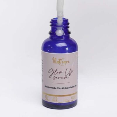 Nat Care Glow Up Serum, enriched with niacinamide and alpha arbutin for brighter, smoother skin, available at BaobabMart.