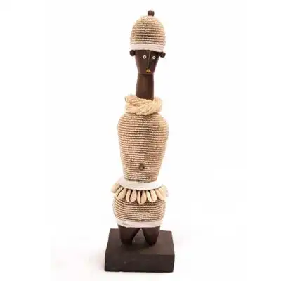Male Namji African Doll crafted with wood and cowrie shells, authentic African decor available at Baobabmart.