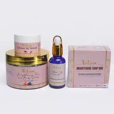 Nat Care Face Cream, Face and Body Scrub, Glow Up Serum, and Soap Bar, a complete skincare bundle for radiant, smooth skin, available at BaobabMart.