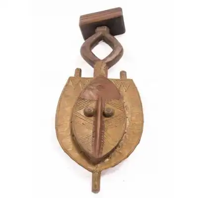African Reliquary Guardian Metal Figure, handcrafted with intricate details, symbolizing protection and spirituality, available at BaobabMart.