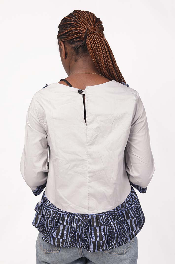 Women’s African Blouse with Ndop Embroidery, a unique blend of cultural design and modern style, available at Baobabmart.