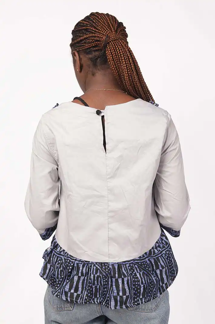 Women’s African Blouse with Ndop Embroidery, a unique blend of cultural design and modern style, available at Baobabmart.