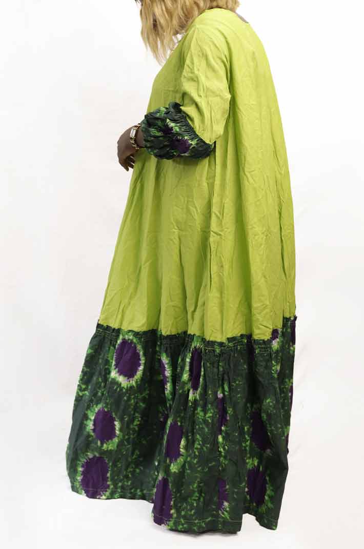Long green basin dress 2 Long Green Basin Dress – vibrant African attire with a flowing silhouette, available at BaobabMart.