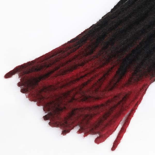 Red and black dreadlocks 12'' 2 Red and Black Dreadlocks Synthetic Hair Extensions, 12 inches long, perfect for bold hairstyles, available at BaobabMart.