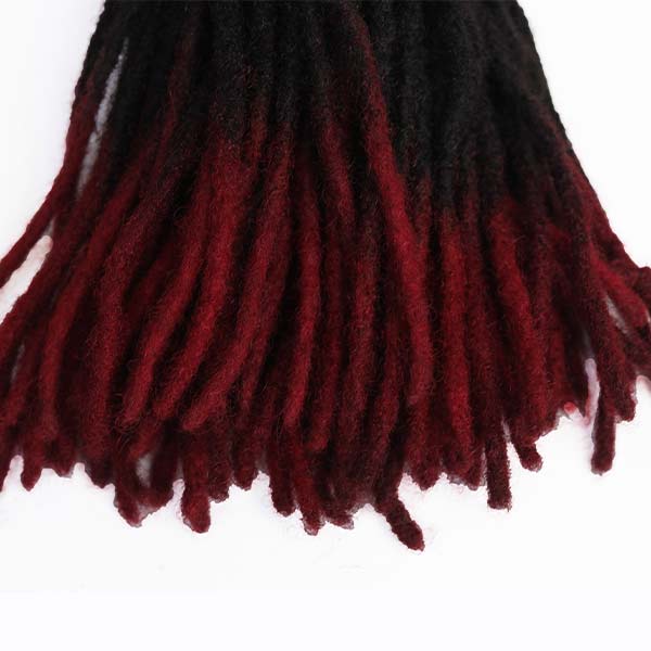 Red and black dreadlocks 12'' 5 Red and Black Dreadlocks Synthetic Hair Extensions, 12 inches long, perfect for bold hairstyles, available at BaobabMart.