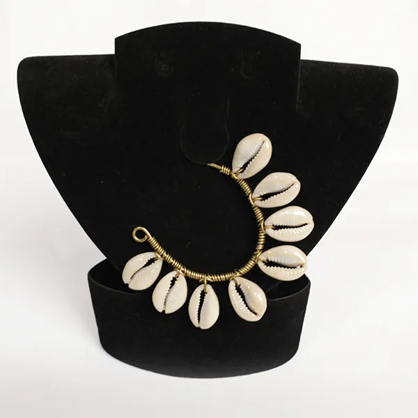 Unique-earpiece-made-of-real-cowrie-shells-decorated-with-bronze3 (1)