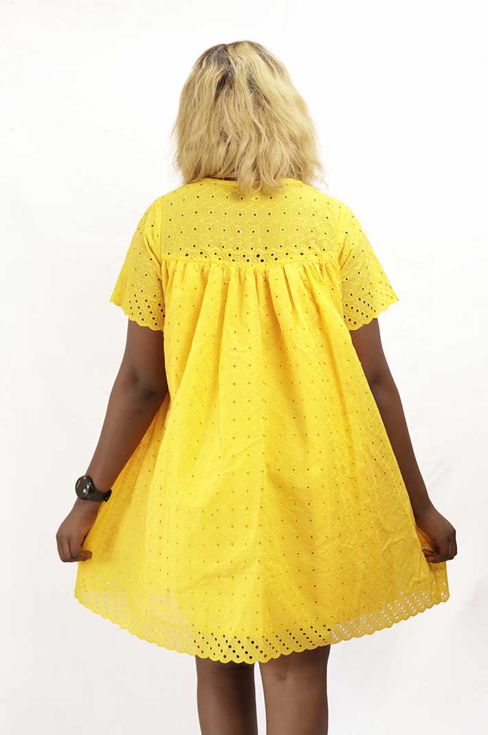 Short dress in yellow lace 3 Short Dress in Yellow Lace for Sale – elegant African attire available at BaobabMart.