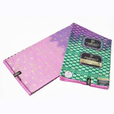 Close-up of Kente Gold Wax Fabric in Green Pink and Purple showing Kente prints