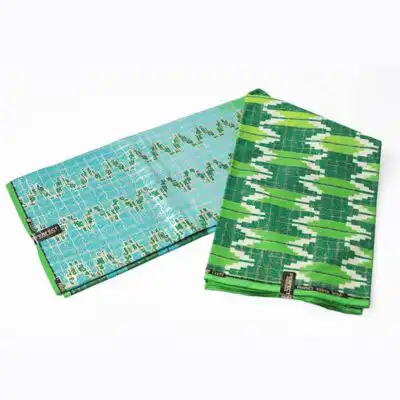 Close-up of 2-tone Green Kente Gold Wax Fabric showing Kente prints