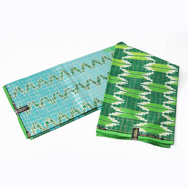 Close-up of 2-tone Green Kente Gold Wax Fabric showing Kente prints