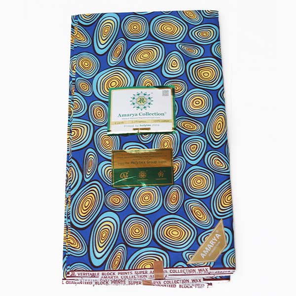 Amaraya Collection blue fabric with yellowish prints 2 Close-up of Amaraya Collection Blue Fabric with Yellowish Prints showing design