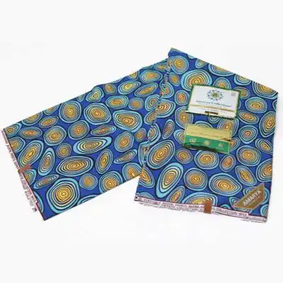 Close-up of Amaraya Collection Blue Fabric with Yellowish Prints showing design