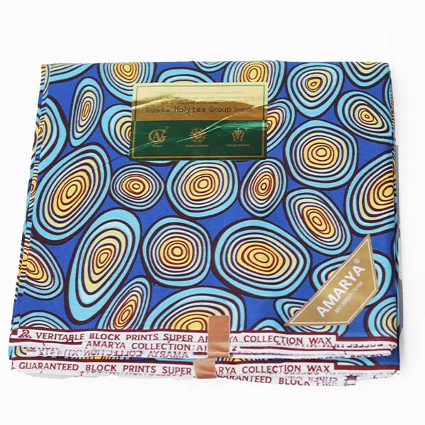 Amaraya Collection blue fabric with yellowish prints 5 Close-up of Amaraya Collection Blue Fabric with Yellowish Prints showing design