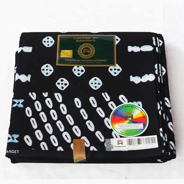 Tissu Hitarget noir avec dés et cercles imprimés – tissu audacieux et élégant disponible chez BaobabMart.