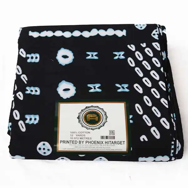 Tissu Hitarget noir avec dés et cercles imprimés 3 Tissu Hitarget noir avec dés et cercles imprimés – tissu audacieux et élégant disponible chez BaobabMart.