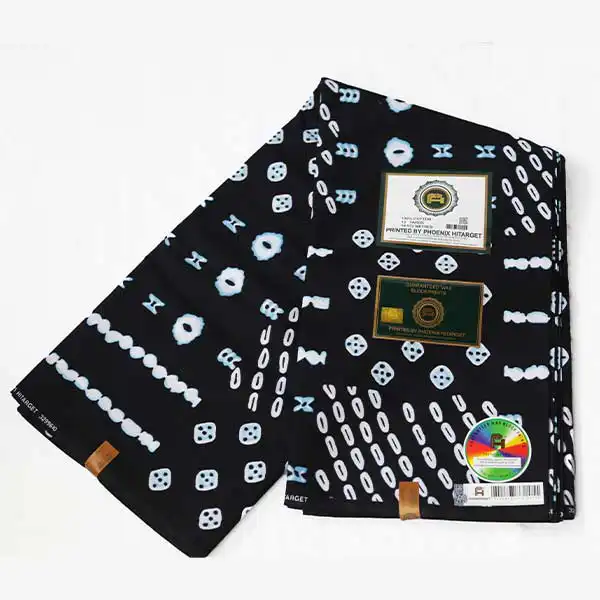 Tissu Hitarget noir avec dés et cercles imprimés – tissu audacieux et élégant disponible chez BaobabMart.