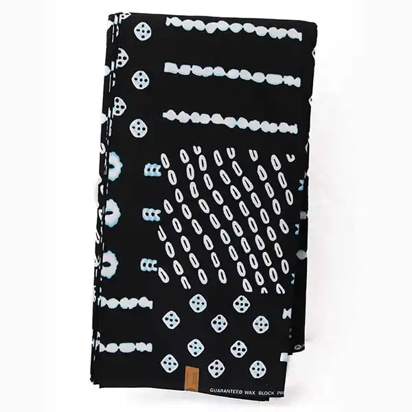 Tissu Hitarget noir avec dés et cercles imprimés 6 Tissu Hitarget noir avec dés et cercles imprimés – tissu audacieux et élégant disponible chez BaobabMart.