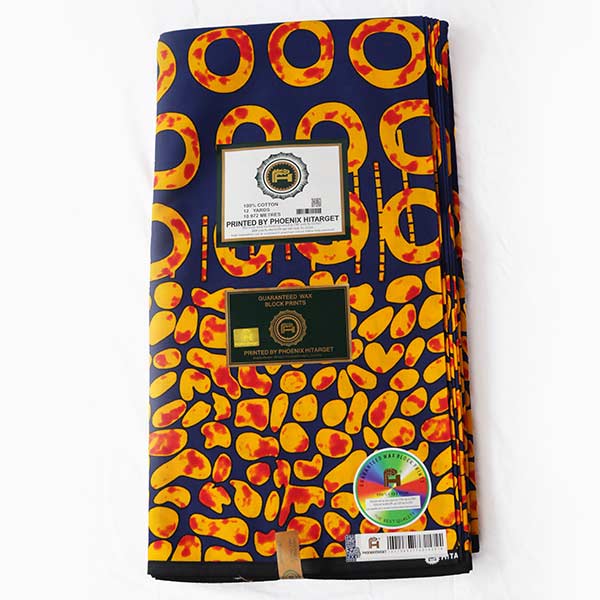 Hitarget Blue and Orange fabric with round prints 2 Close-up of Hitarget Blue and Orange Fabric with Round Prints showing circles