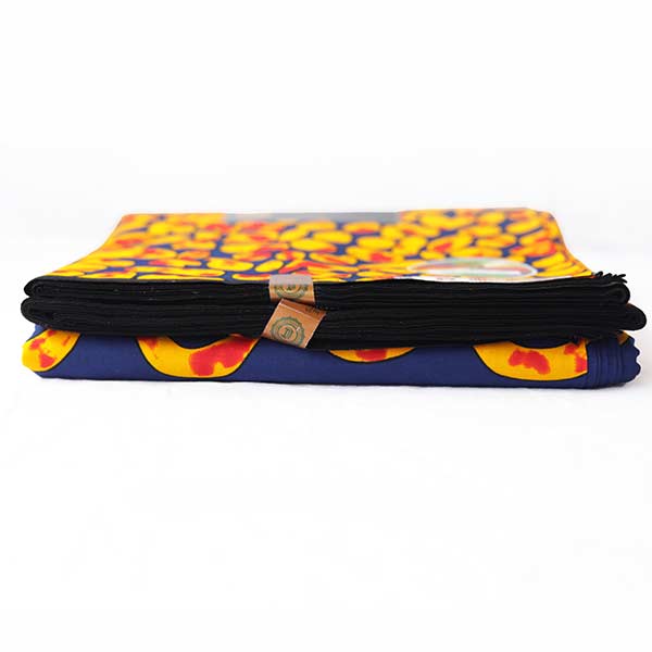 Hitarget Blue and Orange fabric with round prints 6 Close-up of Hitarget Blue and Orange Fabric with Round Prints showing circles