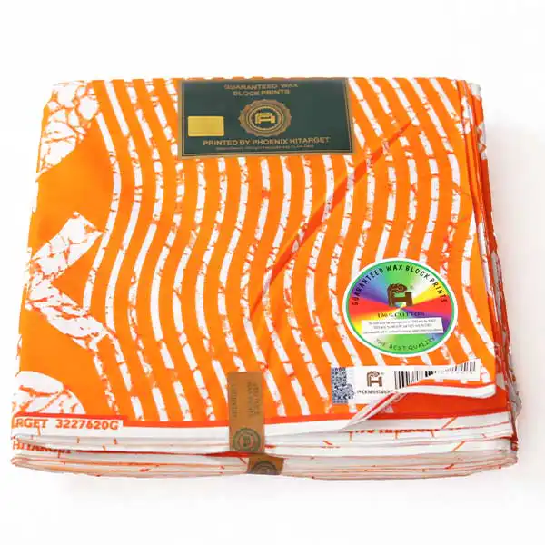 Tissu africain Hitarget XO Orange à vendre avec des imprimés XO orange acidulés chez Baobabmart