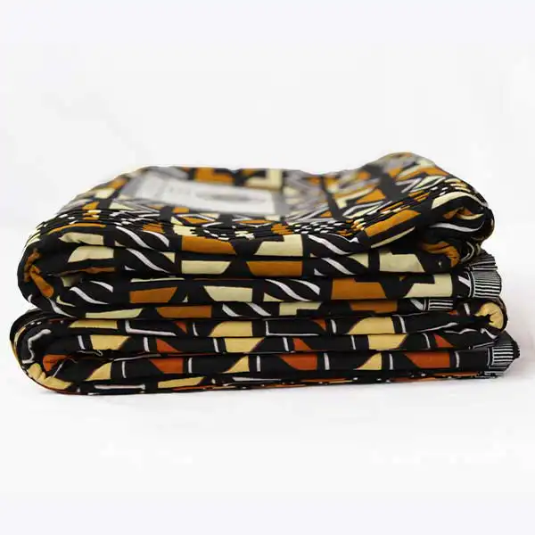Tissu Hitarget à formes géométriques jaune, marron et noir – tissu audacieux et élégant disponible chez BaobabMart.