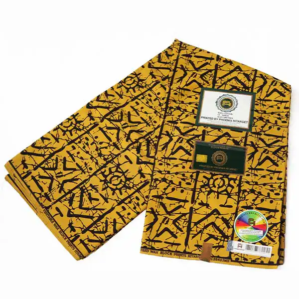 Tissu jaune moutarde Hitarget avec motifs ethniques noirs – tissu audacieux et élégant disponible chez BaobabMart.