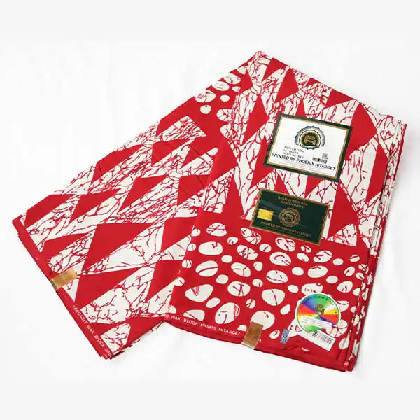 Tissu imprimé triangulaire rouge et blanc Hitarget – tissu audacieux et élégant disponible chez BaobabMart.
