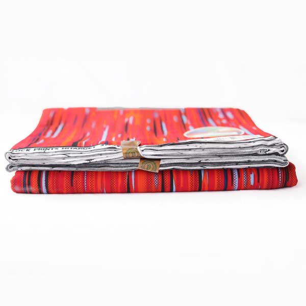 Hitarget red fabric with blue and black vertical prints 5 Close-up of Fabric with Blue and Black Vertical Prints showing stripes