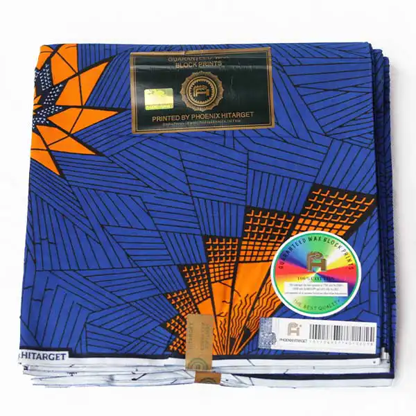 Printed blue Hitarget fabric with orange motifs 1 Printed Blue Hitarget Fabric with Orange Motifs – bold and vibrant fabric at BaobabMart.