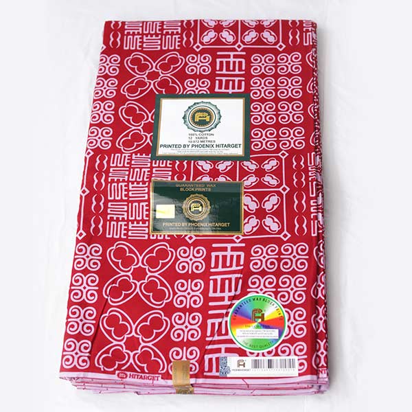 Red Hitarget Fabric with White Motifs – vibrant African-inspired fabric at BaobabMart.