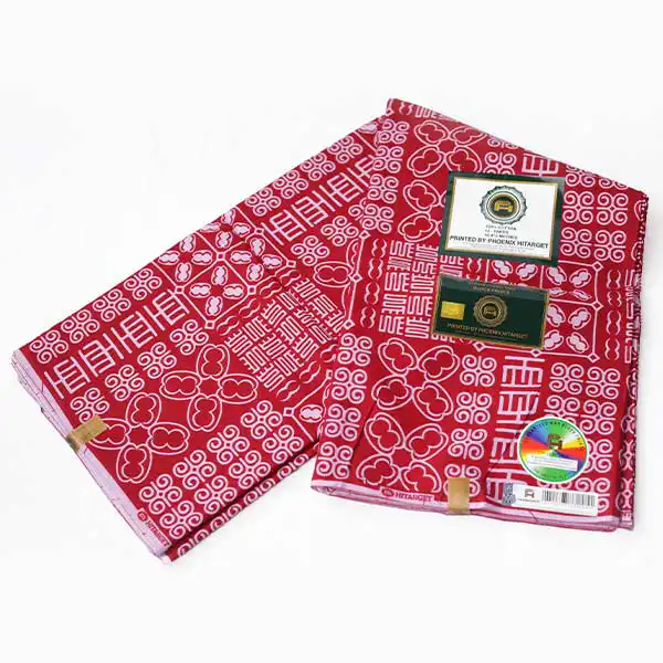 Red Hitarget Fabric with White Motifs – vibrant African-inspired fabric at BaobabMart.