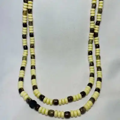Traditional Brown and Cream White Necklace – authentic accessory available at BaobabMart.