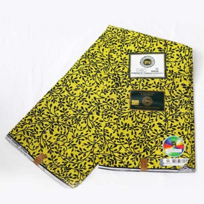 Close-up of Yellow Hitarget Fabric with Black Foliage Prints showing foliage